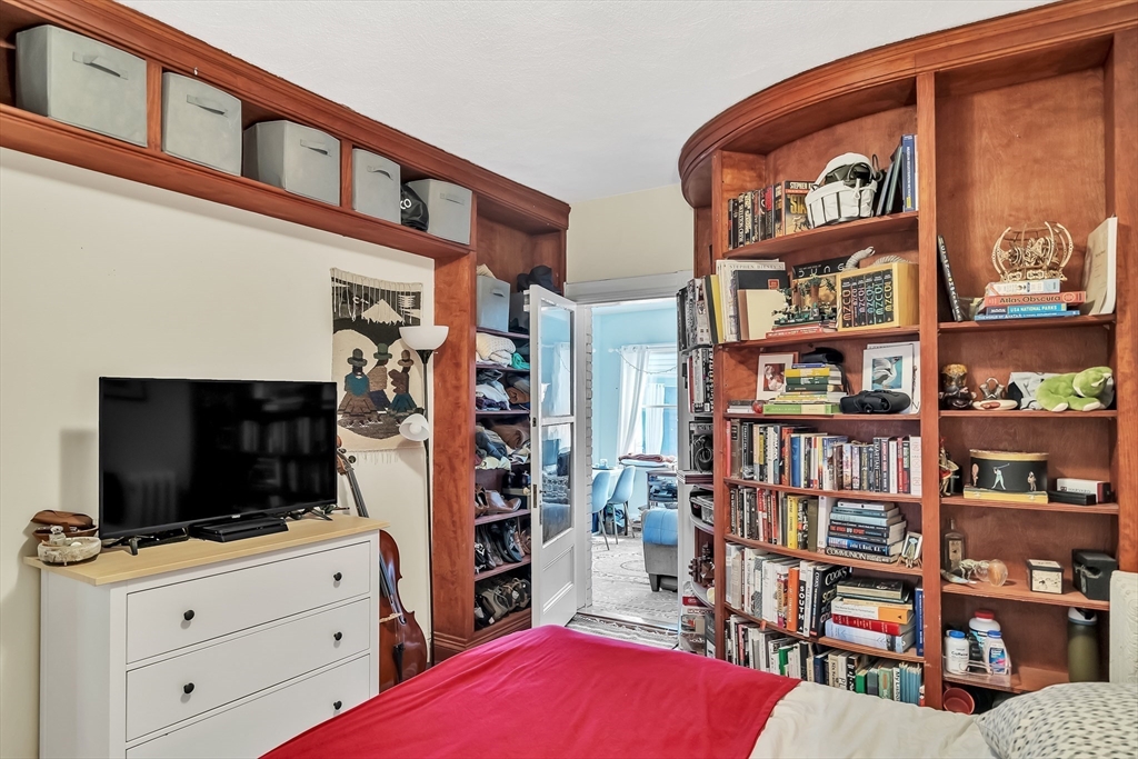 1891 Beacon Street, Unit 2 Brookline, MA 02445 - Photo 24 of 31 a view of living room with furniture and book shelf