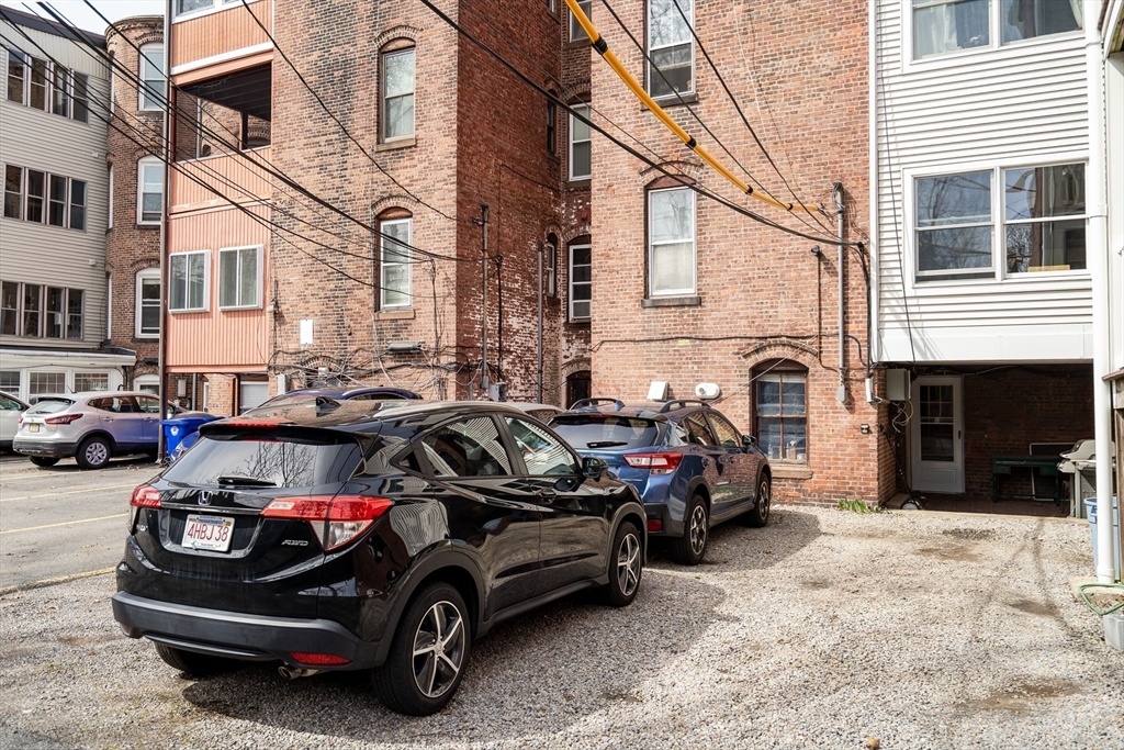 1891 Beacon Street, Unit 2 Brookline, MA 02445 - Photo 31 of 31 a car parked in front of a house