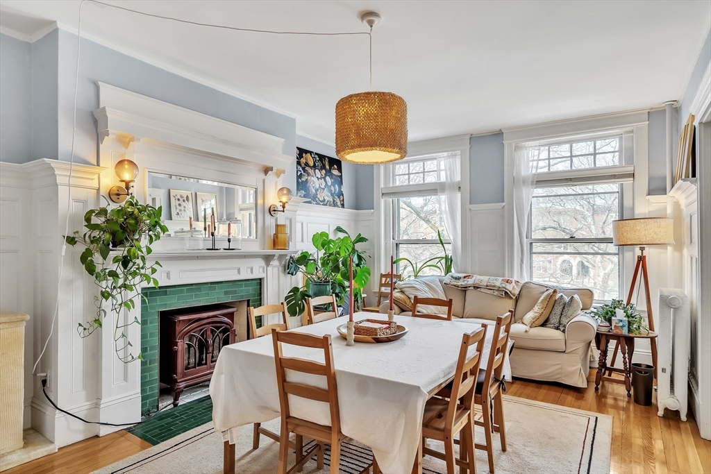 1891 Beacon Street, Unit 2 Brookline, MA 02445 - Photo 9 of 31 a dining room with furniture window and wooden floor