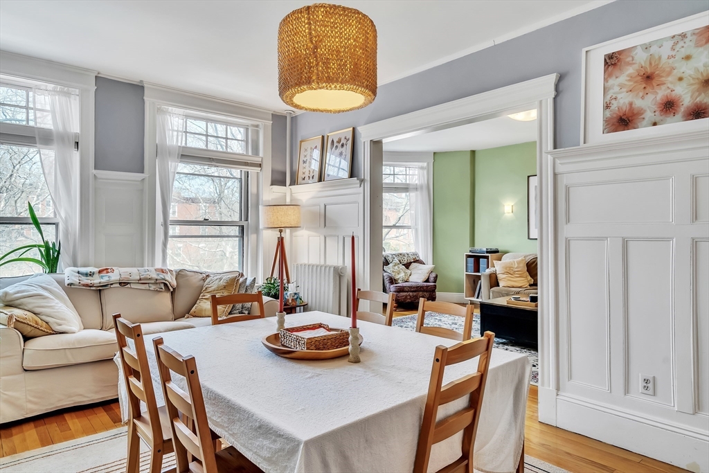 1891 Beacon Street, Unit 2 Brookline, MA 02445 - Photo 10 of 31 a view of a dining room with furniture window and wooden floor