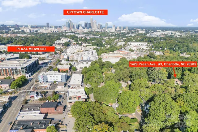 a view of a city with tall buildings