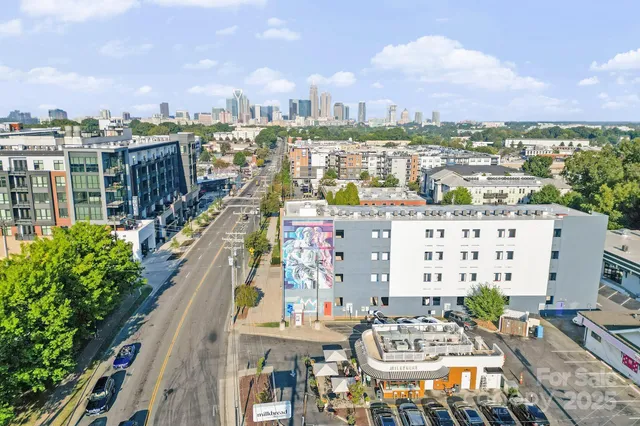 a view of a street with cars