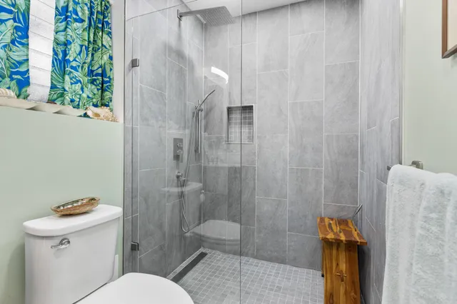 a bathroom with a toilet a sink and a bathtub