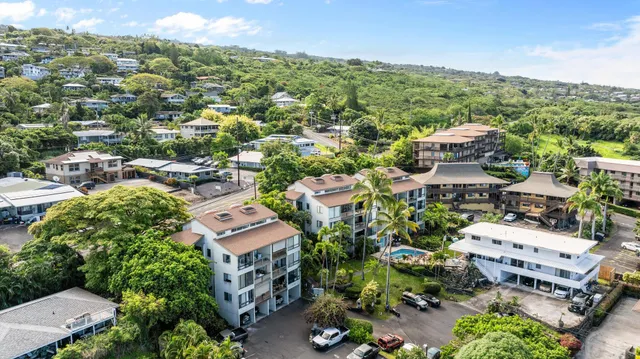 a kitchen with granite countertop cabinets stainless steel appliances and a sink