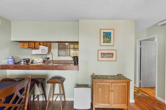 a kitchen with a sink and a window