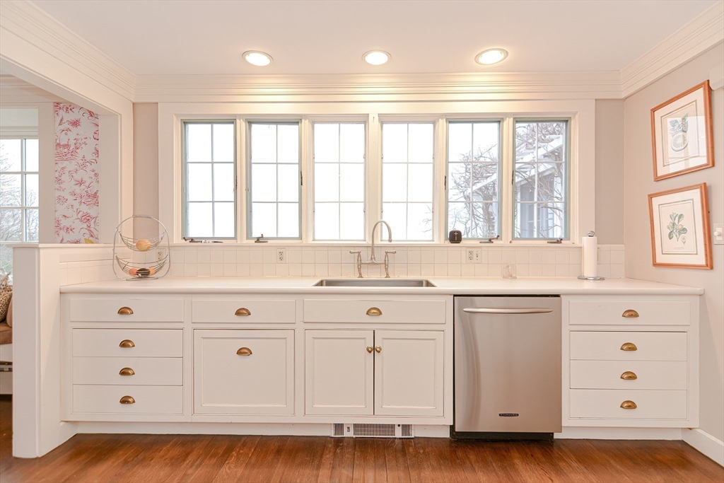 33 Way Road Gloucester, MA 01930 - Photo 21 of 38 a kitchen with a sink window and cabinets