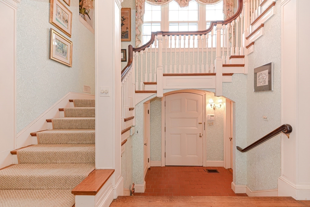 33 Way Road Gloucester, MA 01930 - Photo 23 of 38 a view of entryway with wooden floor and stairs