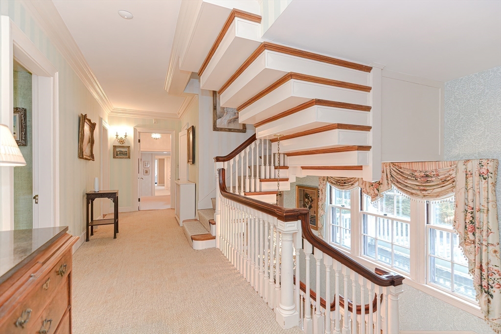 33 Way Road Gloucester, MA 01930 - Photo 24 of 38 a view of an entryway with wooden floor and windows