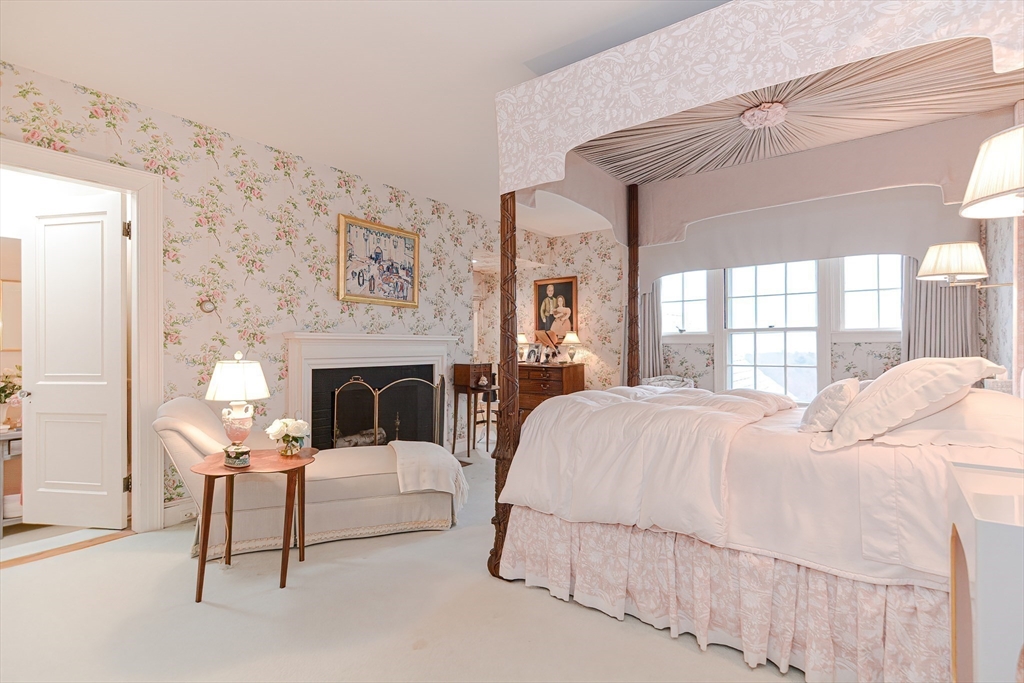 33 Way Road Gloucester, MA 01930 - Photo 25 of 38 a bedroom with a bed and a fireplace