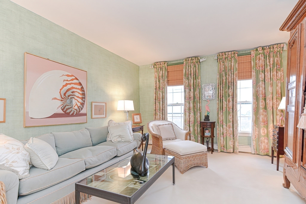 33 Way Road Gloucester, MA 01930 - Photo 26 of 38 a living room with furniture and a large window with outer view