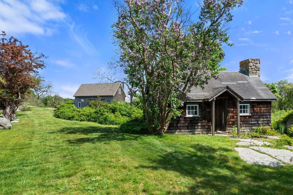 33 Way Road Gloucester, MA 01930 - Photo 32 of 38 a front view of house with yard and green space