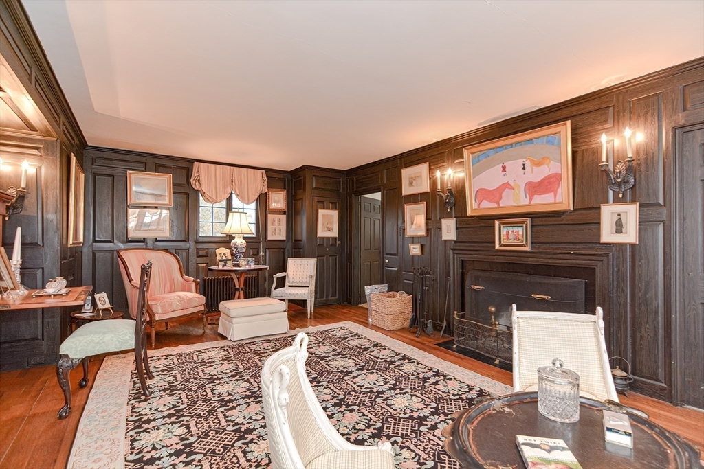 33 Way Road Gloucester, MA 01930 - Photo 9 of 38 a living room with furniture a rug and a floor to ceiling window