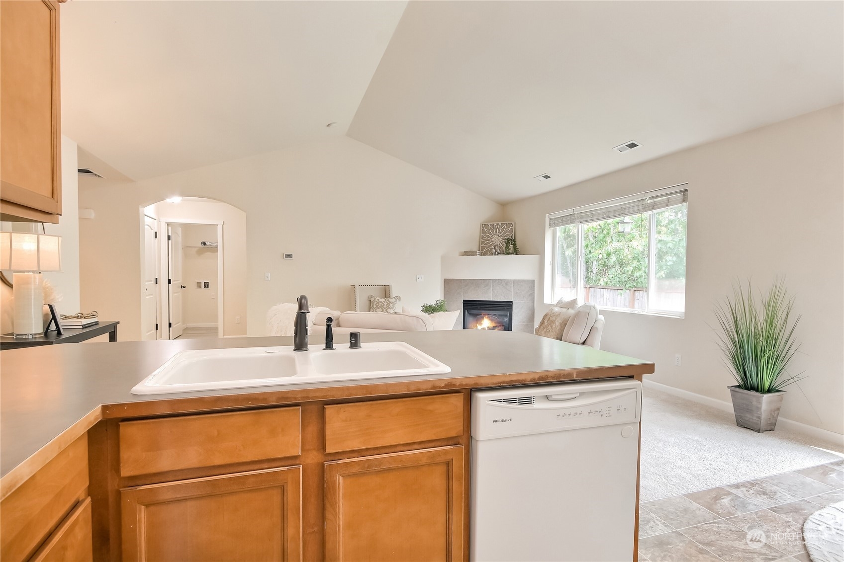9814 201st Street East Graham, WA 98338 - Photo 13 of 40 a bathroom with a granite countertop sink a large mirror and a shower