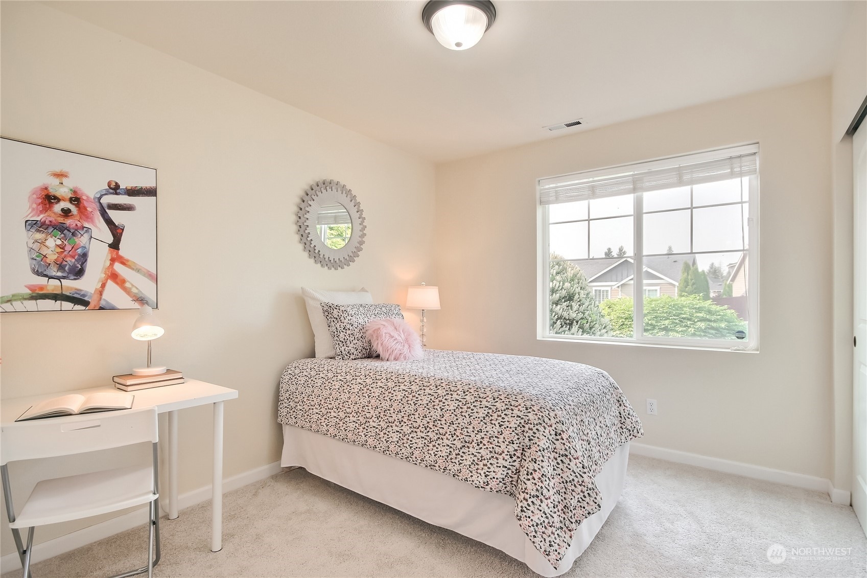 9814 201st Street East Graham, WA 98338 - Photo 22 of 40 a bedroom with a bed and a window