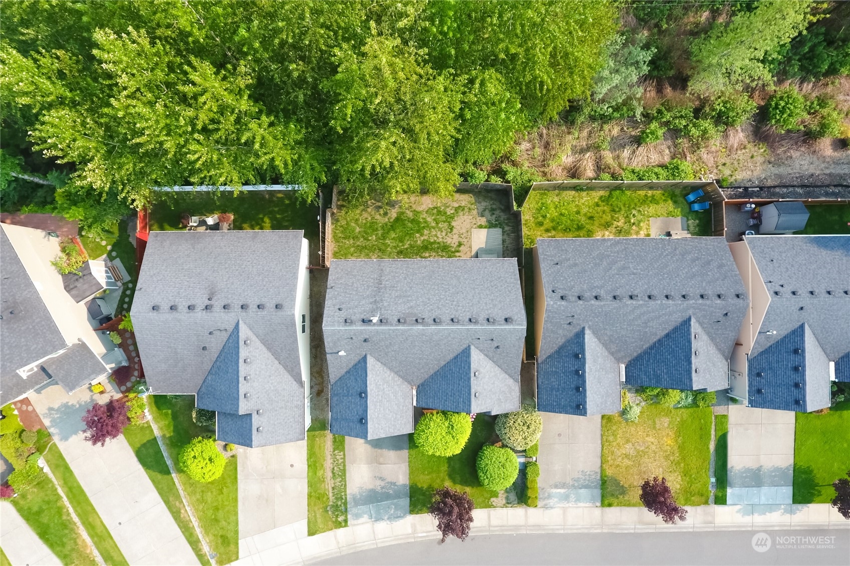 9814 201st Street East Graham, WA 98338 - Photo 31 of 40 an aerial view of multiple houses with yard