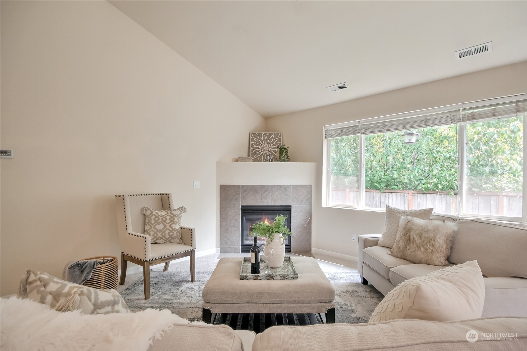 9814 201st Street East Graham, WA 98338 - Photo 5 of 40 a living room with furniture and a fireplace