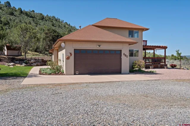 a backyard of a house with lots of green space