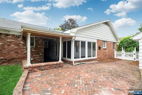 a view of a house with a garden