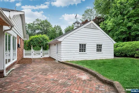 a view of a backyard with a garden