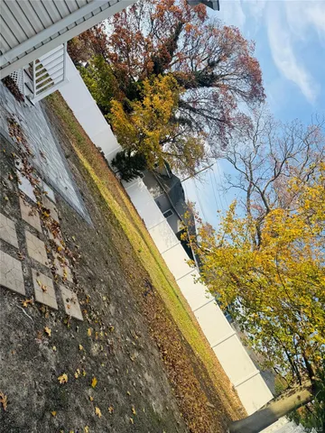 a view of swimming pool from a yard