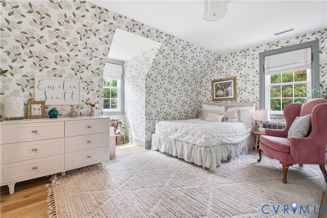 7200 Three Chopt Road Richmond, VA 23226 - Photo 25 of 48 Attic bedroom featuring hardwood flooring, multipl