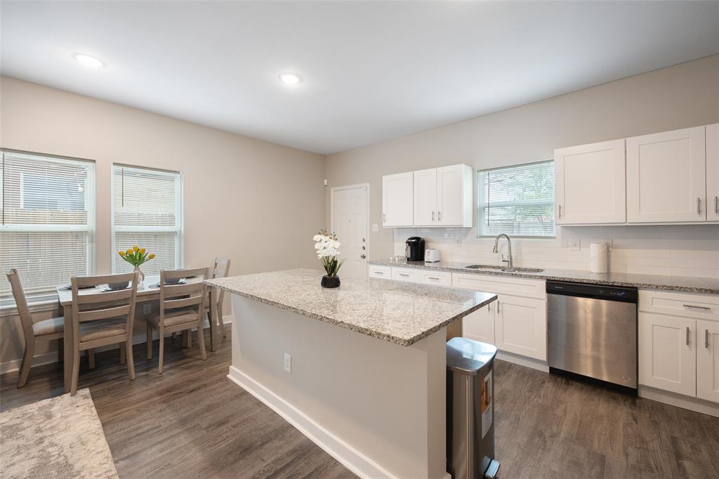 5004 Colonial Avenue Dallas, TX 75215 - Photo 7 of 20 a kitchen with a sink and cabinets