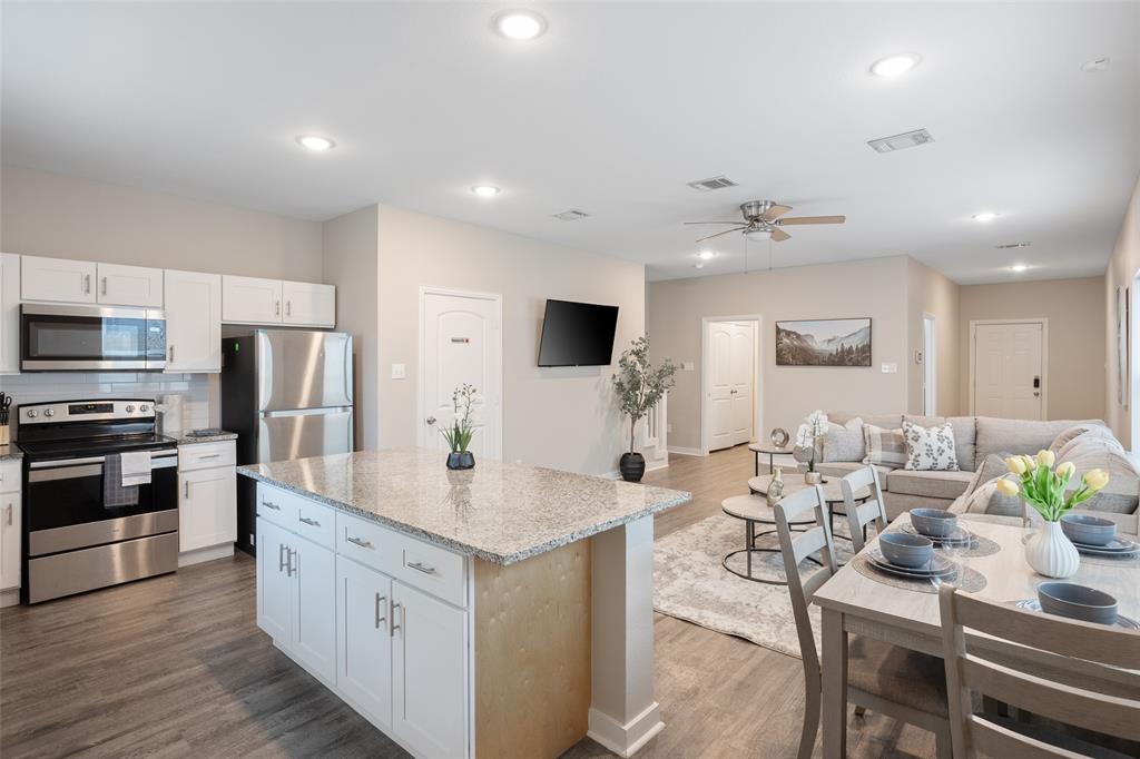 5004 Colonial Avenue Dallas, TX 75215 - Photo 9 of 20 a kitchen with counter space cabinets and appliances