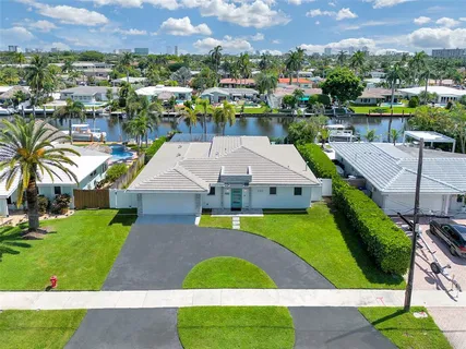 a aerial view of a house with a garden