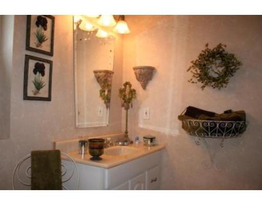 5 Garland Street Everett, MA 02149 - Photo 11 of 17 a bathroom with a sink and a mirror