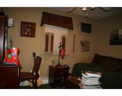 5 Garland Street Everett, MA 02149 - Photo 16 of 17 a living room with furniture and a flat screen tv
