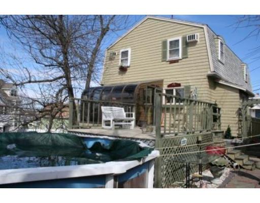 5 Garland Street Everett, MA 02149 - Photo 3 of 17 a front view of a house with yard
