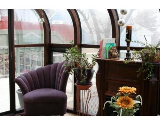 5 Garland Street Everett, MA 02149 - Photo 4 of 17 a balcony with furniture and a large window