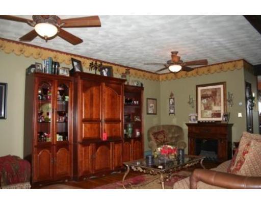 5 Garland Street Everett, MA 02149 - Photo 9 of 17 a bedroom with furniture and wooden floor