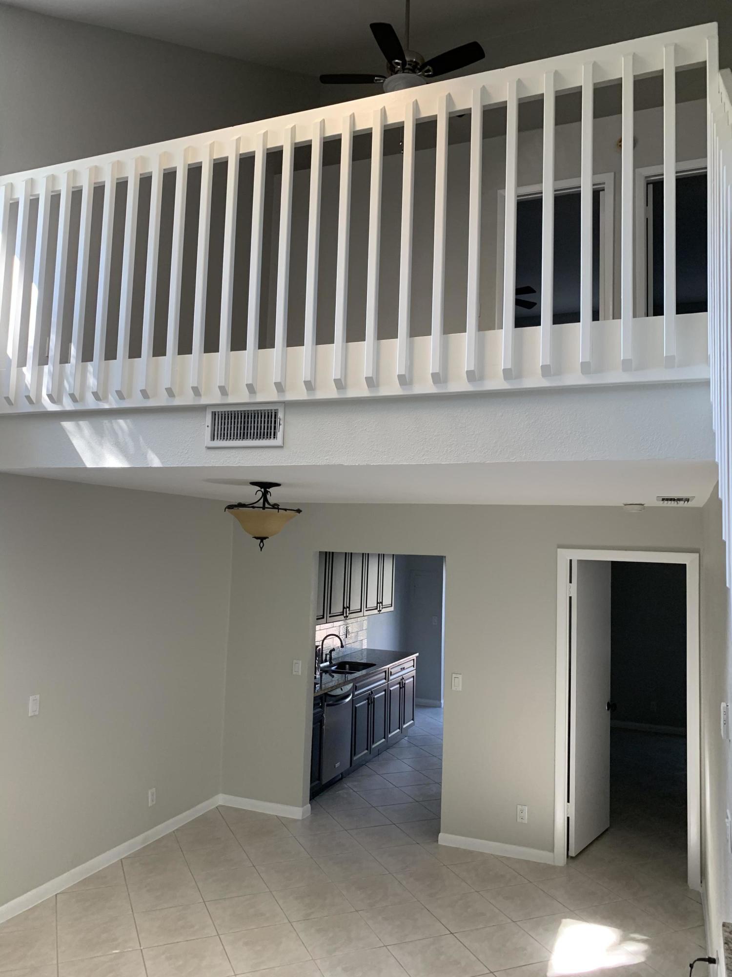 320 Southeast 2nd Avenue, Unit B1 Deerfield Beach, FL 33441 - Photo 16 of 22 a utility room with a sink and cabinets