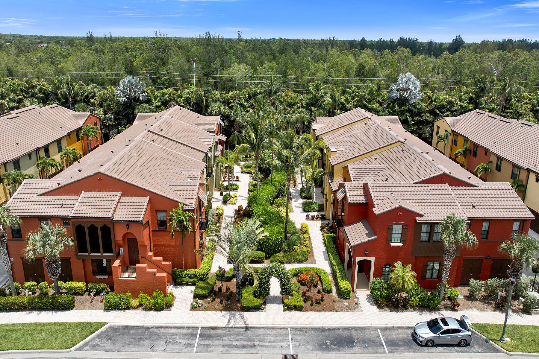 9066 Albion Lane North, Unit 5101 Naples, FL 34113 - Photo 48 of 48 an aerial view of multiple houses