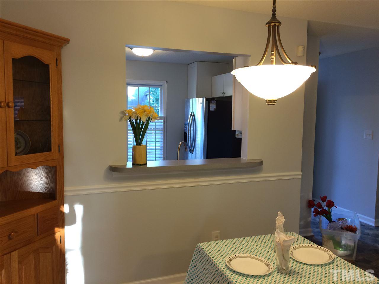 515 Windcrest Road Durham, NC 27713 - Photo 3 of 15 Kitchen is open to dining and living areas.