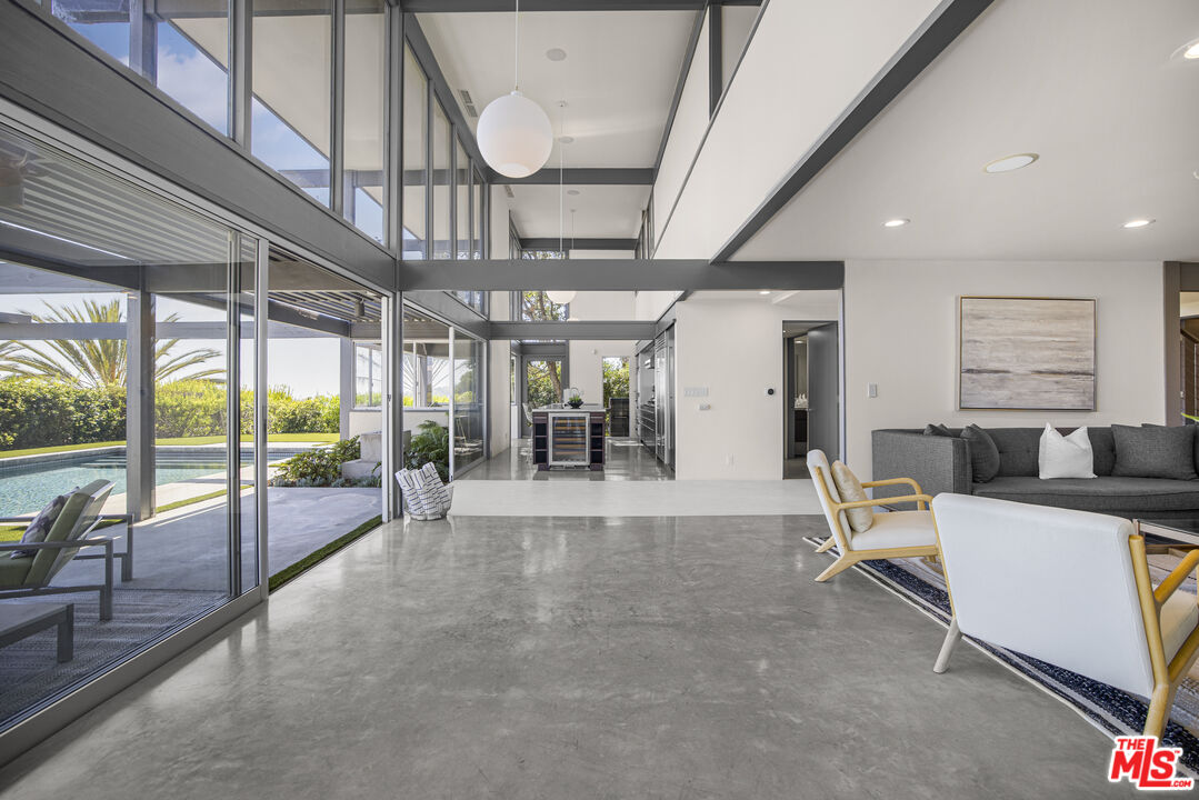 9892 Beverly Grove Drive Beverly Hills, CA 90210 - Photo 11 of 39 a view of a room with gym equipment