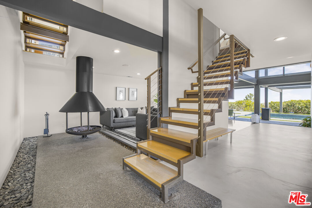 9892 Beverly Grove Drive Beverly Hills, CA 90210 - Photo 5 of 39 a view of entryway and hall with wooden floor