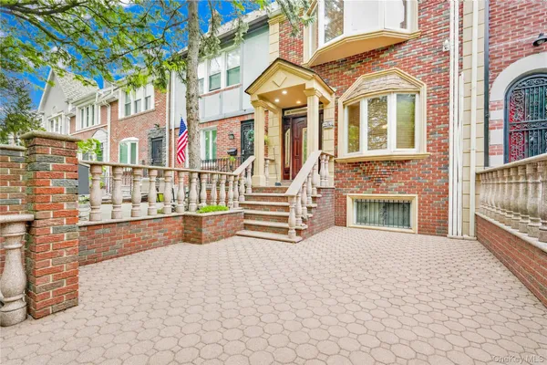 a view of a house with a street