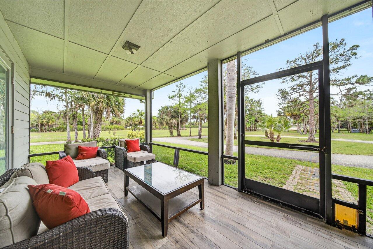 2741 Buck Ridge Trail Loxahatchee, FL 33470 - Photo 12 of 38 Screened Patio