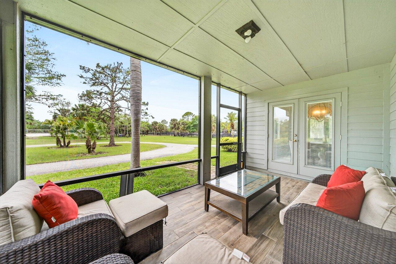 2741 Buck Ridge Trail Loxahatchee, FL 33470 - Photo 13 of 38 Screened Patio