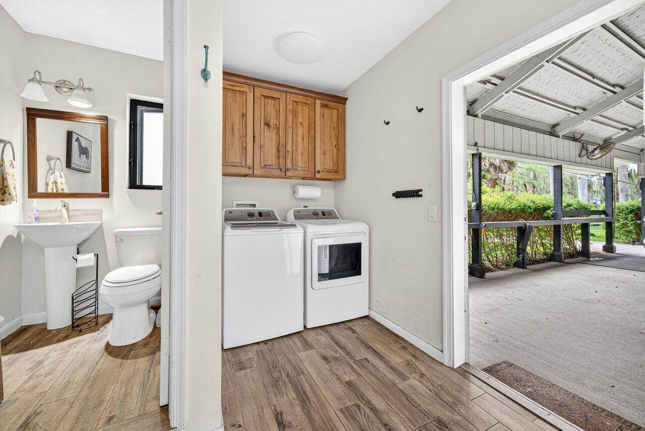2741 Buck Ridge Trail Loxahatchee, FL 33470 - Photo 20 of 38 Tack room half bath and Laundry