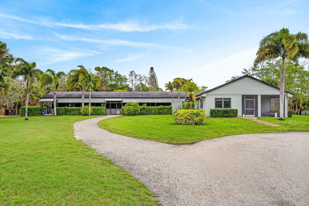 2741 Buck Ridge Trail Loxahatchee, FL 33470 - Photo 3 of 38 House and 6 stall barn