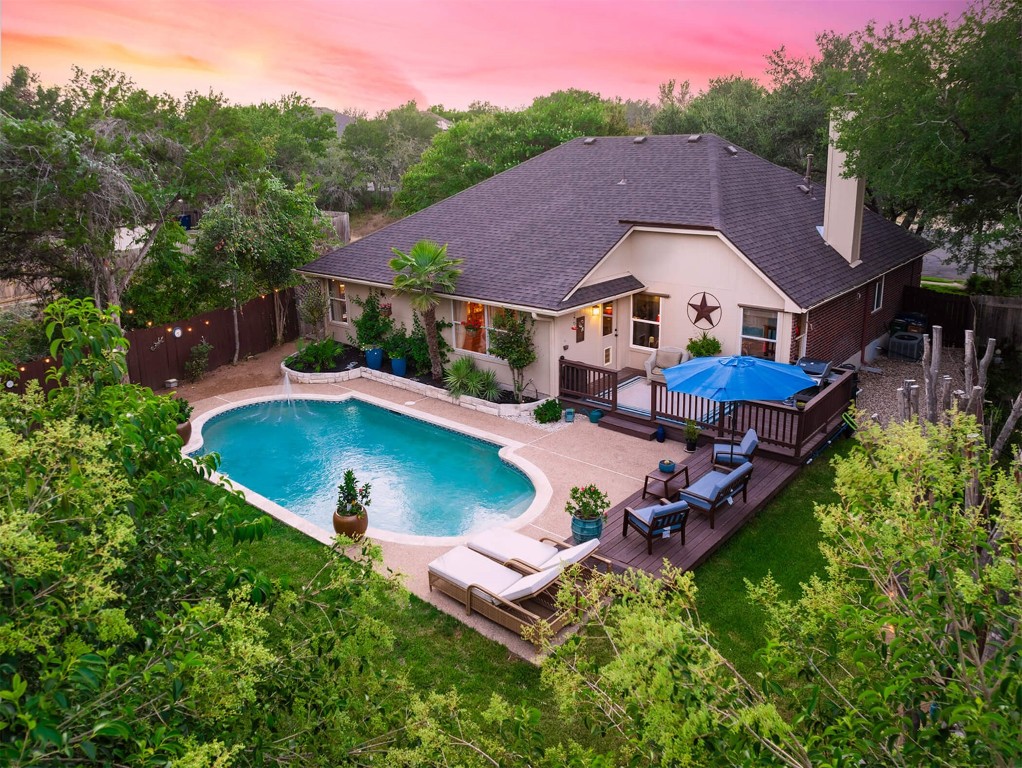 8517 Moose Cove Austin, TX 78749 - Photo 1 of 1 an aerial view of a house with swimming pool and garden