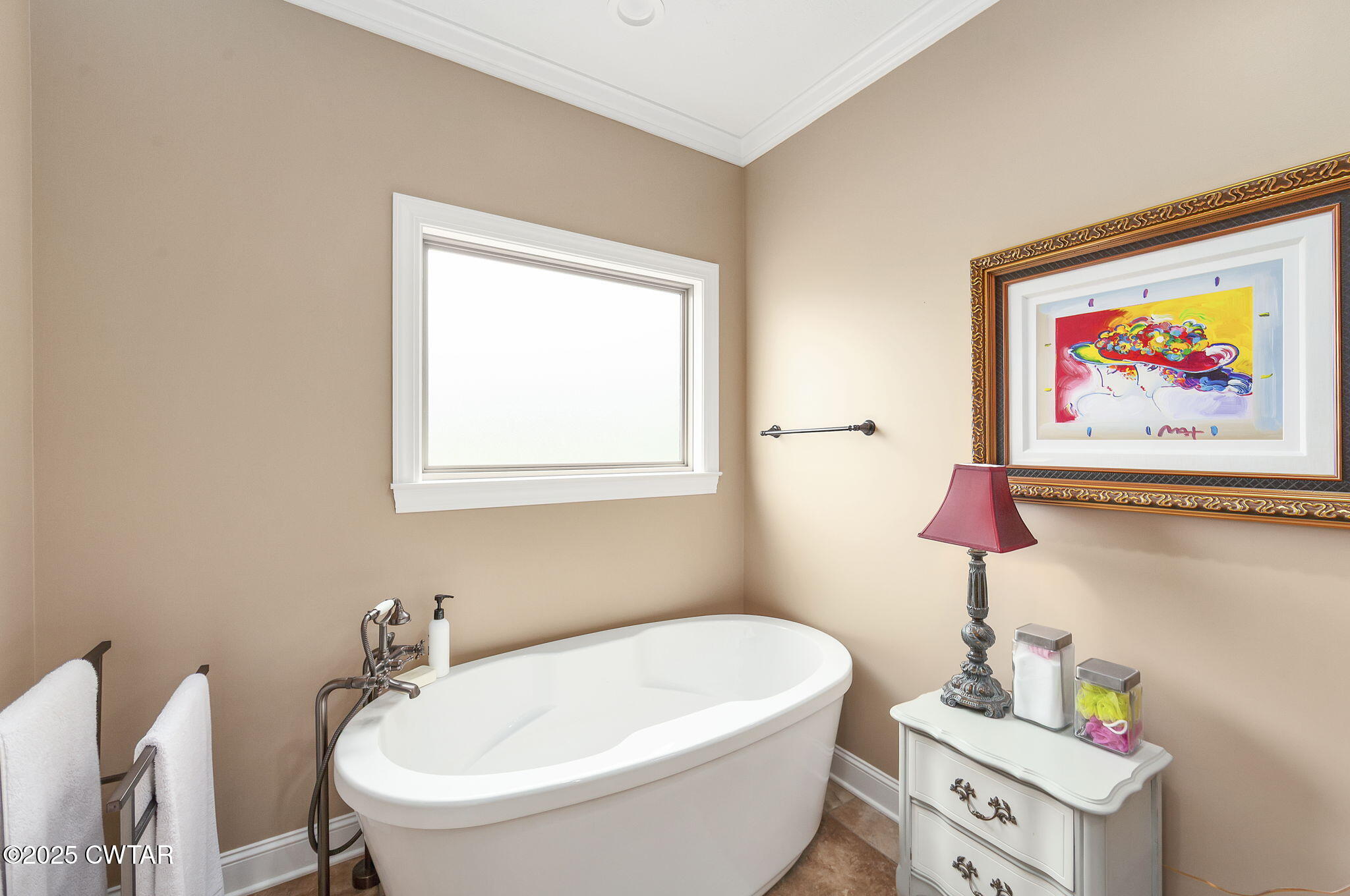 325 Ridgewood Drive Henderson, TN 38340 - Photo 18 of 63 a white bath tub sitting next to a white sink