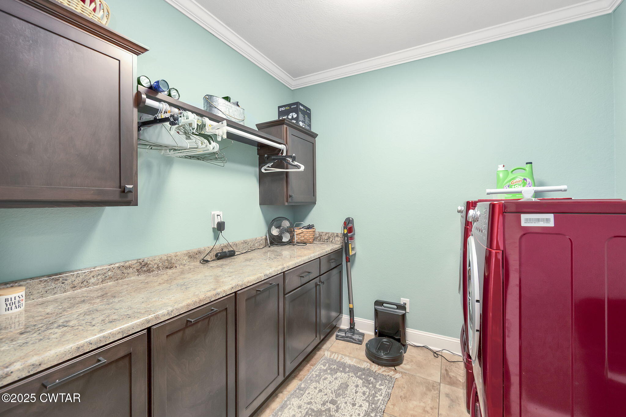 325 Ridgewood Drive Henderson, TN 38340 - Photo 23 of 63 a utility room with a sink and wooden floor