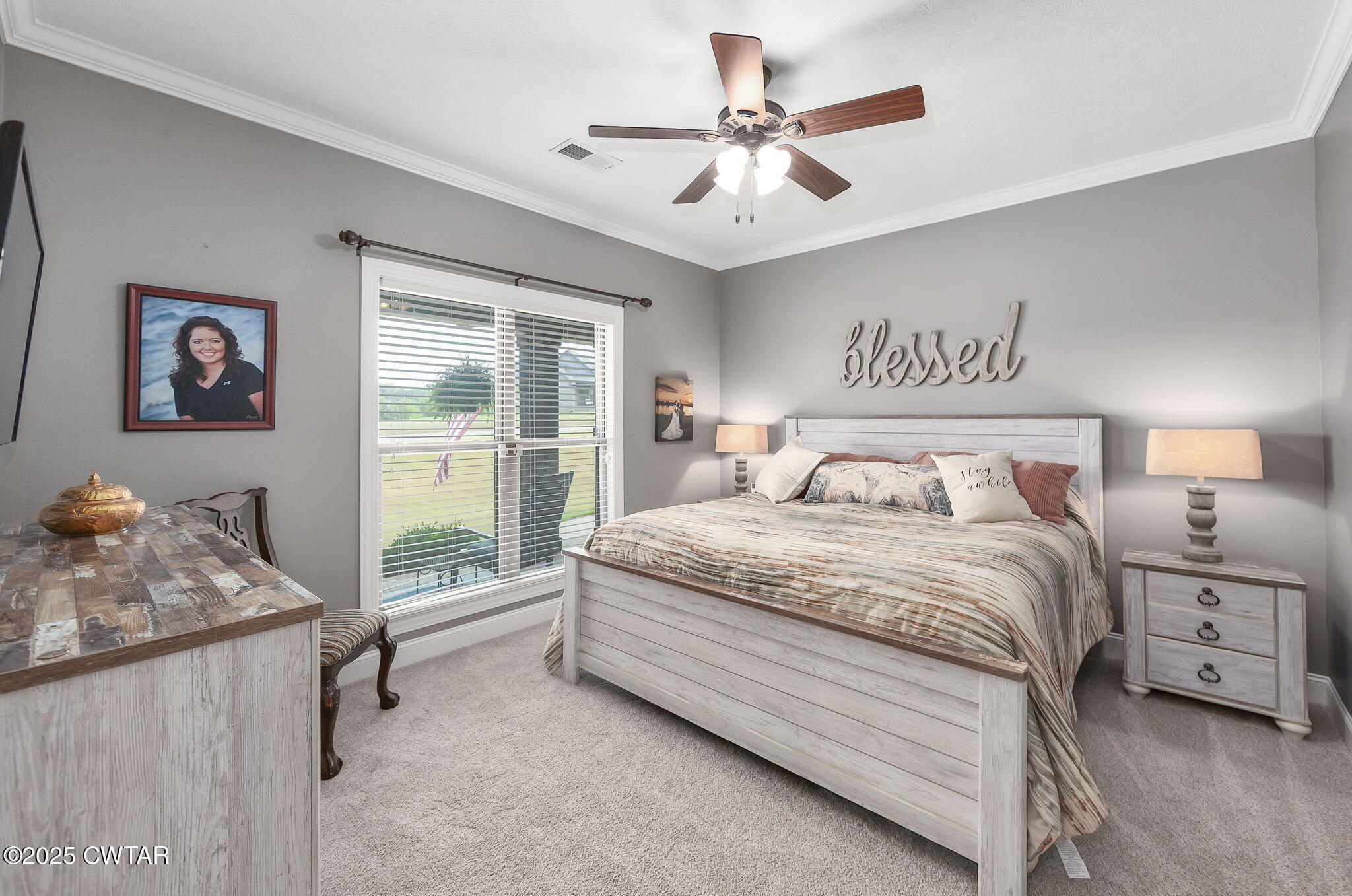 325 Ridgewood Drive Henderson, TN 38340 - Photo 24 of 63 a spacious bedroom with a bed and a window