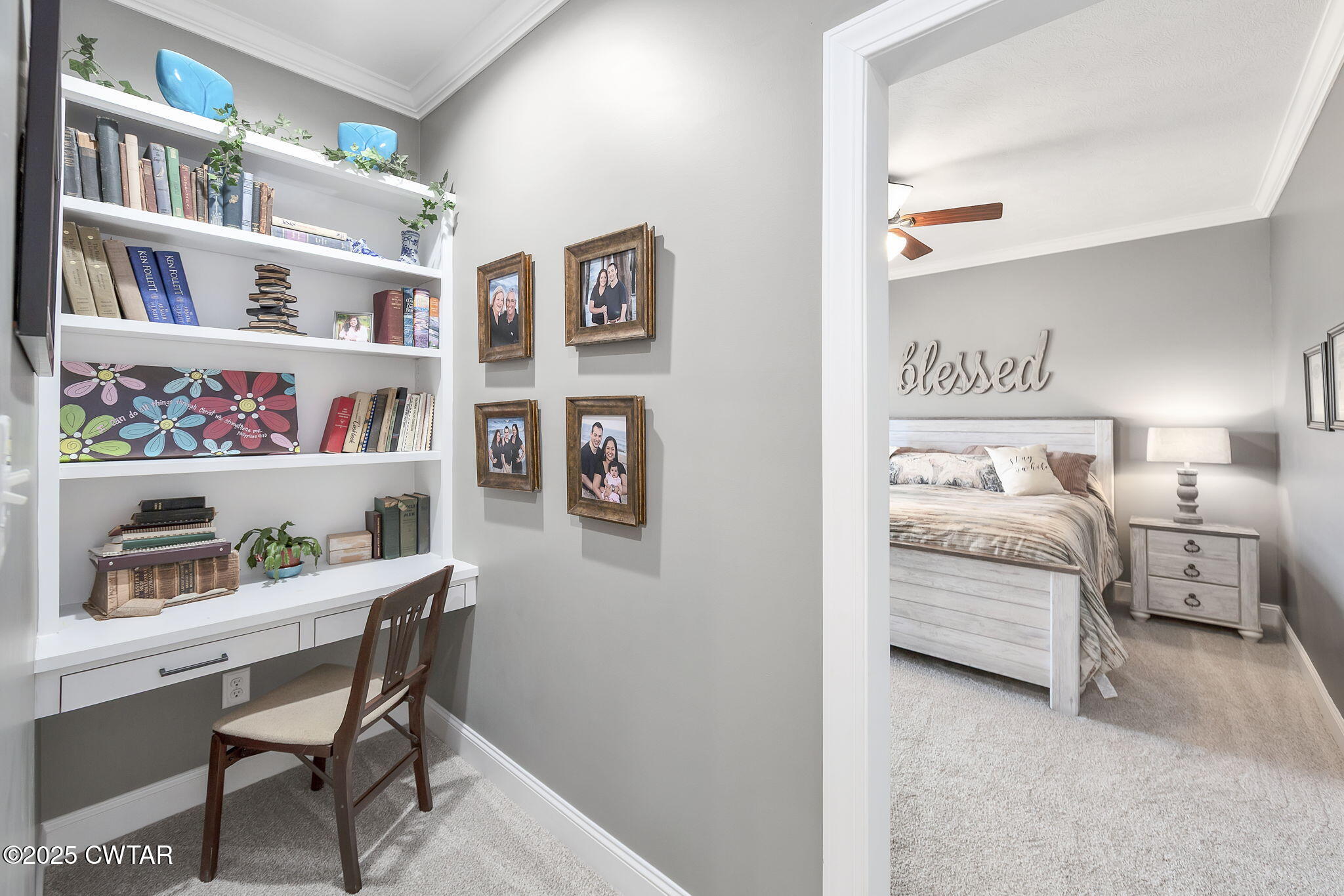 325 Ridgewood Drive Henderson, TN 38340 - Photo 26 of 63 a bedroom with a bed and a bookshelf