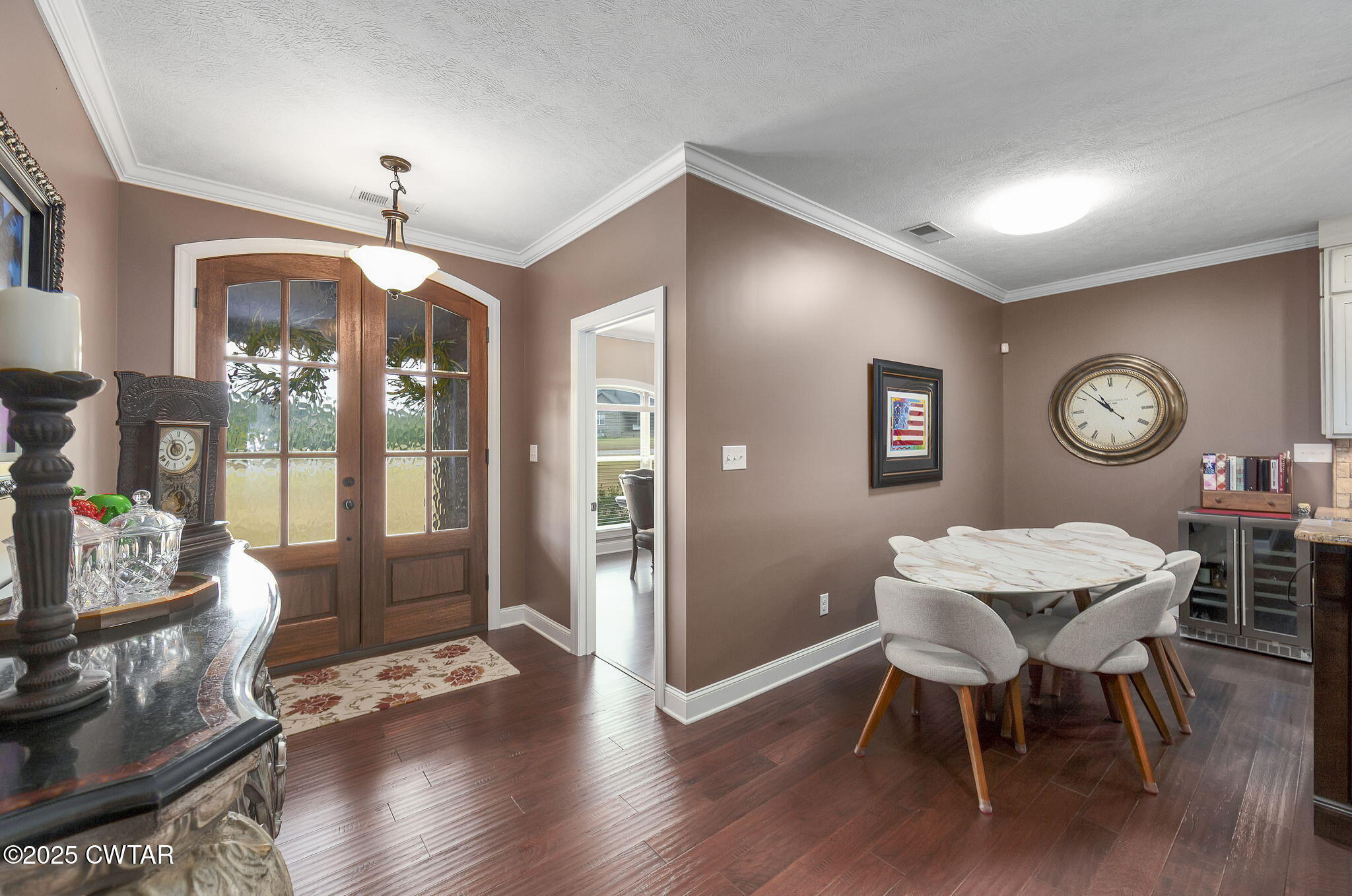 325 Ridgewood Drive Henderson, TN 38340 - Photo 4 of 63 a view of a dining room with furniture window and wooden floor
