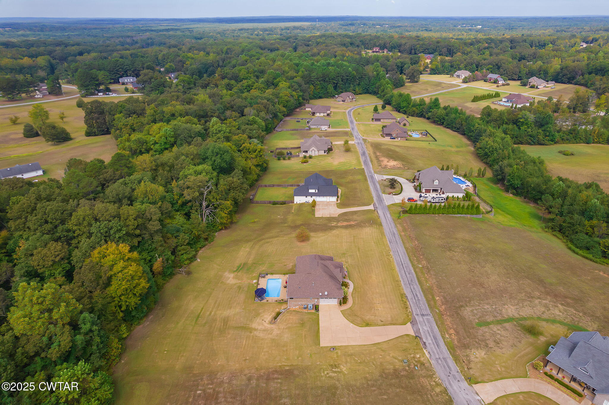 325 Ridgewood Drive Henderson, TN 38340 - Photo 56 of 63 an aerial view of a house with a garden
